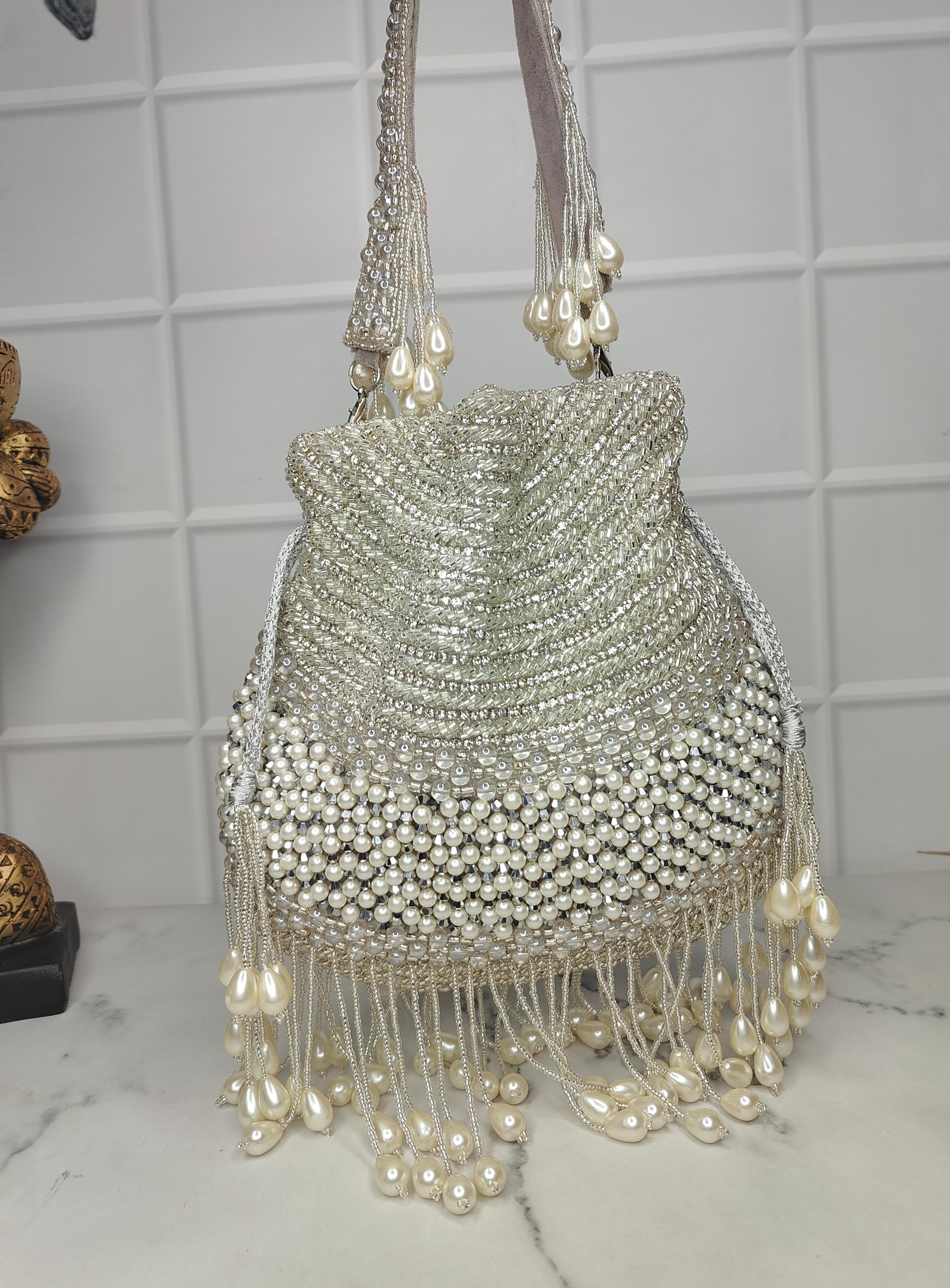 Swisni silver heavy potli bags