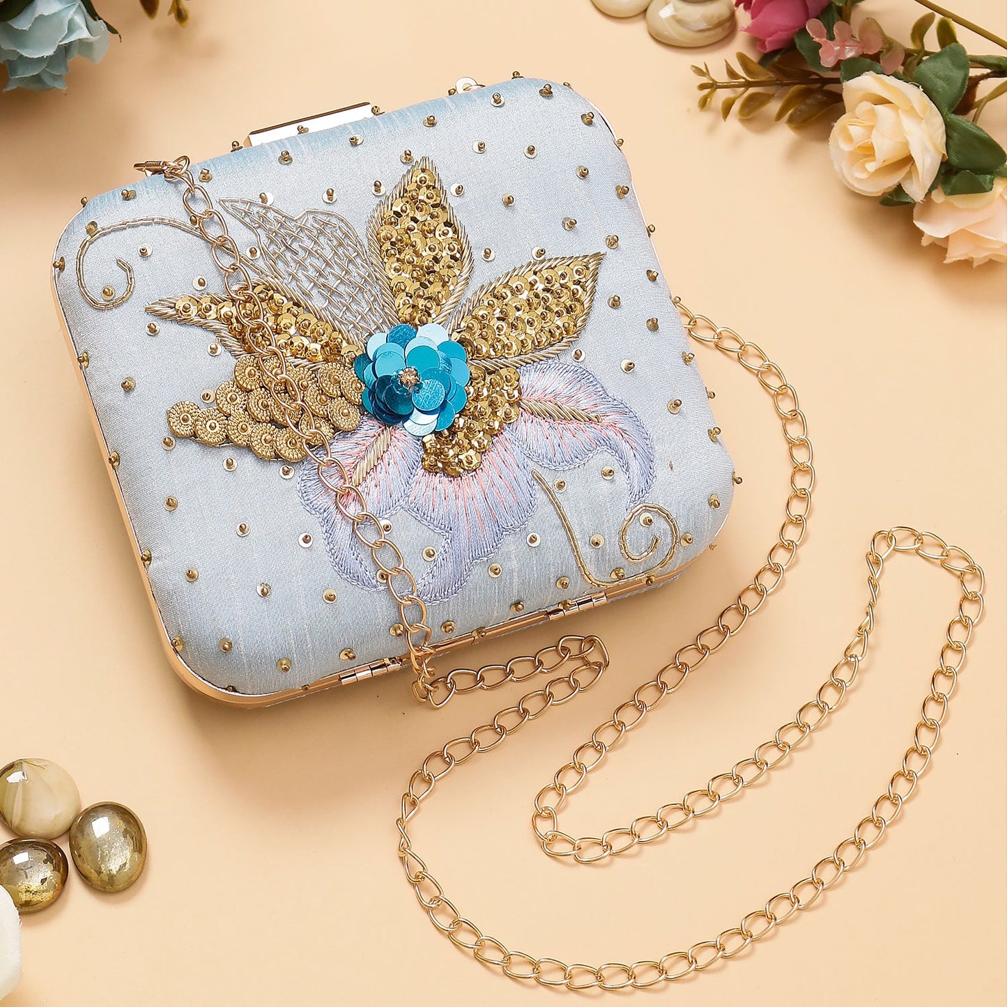 Swisni square sky blue embroidered clutch bag