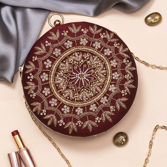 Swisni marron round clutch