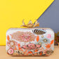 Eye catchy embellishment designer clutch