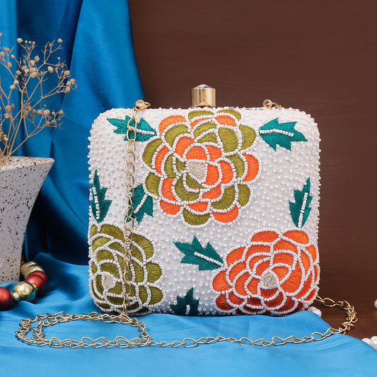 White embroidered floral clutch bag