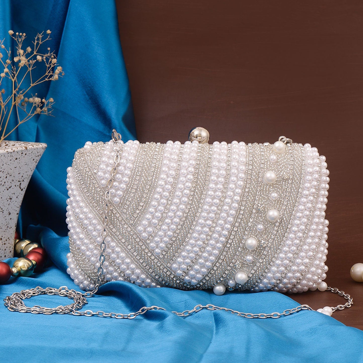 White pearl embroidered clutch bag