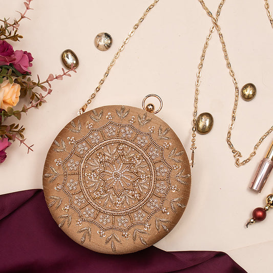 Swisni gold round clutch