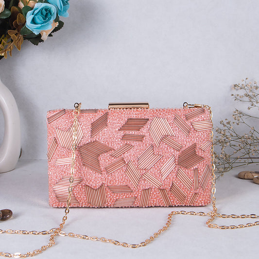 Swisni peach embroidered clutch