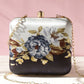 Printed floral clutch bag