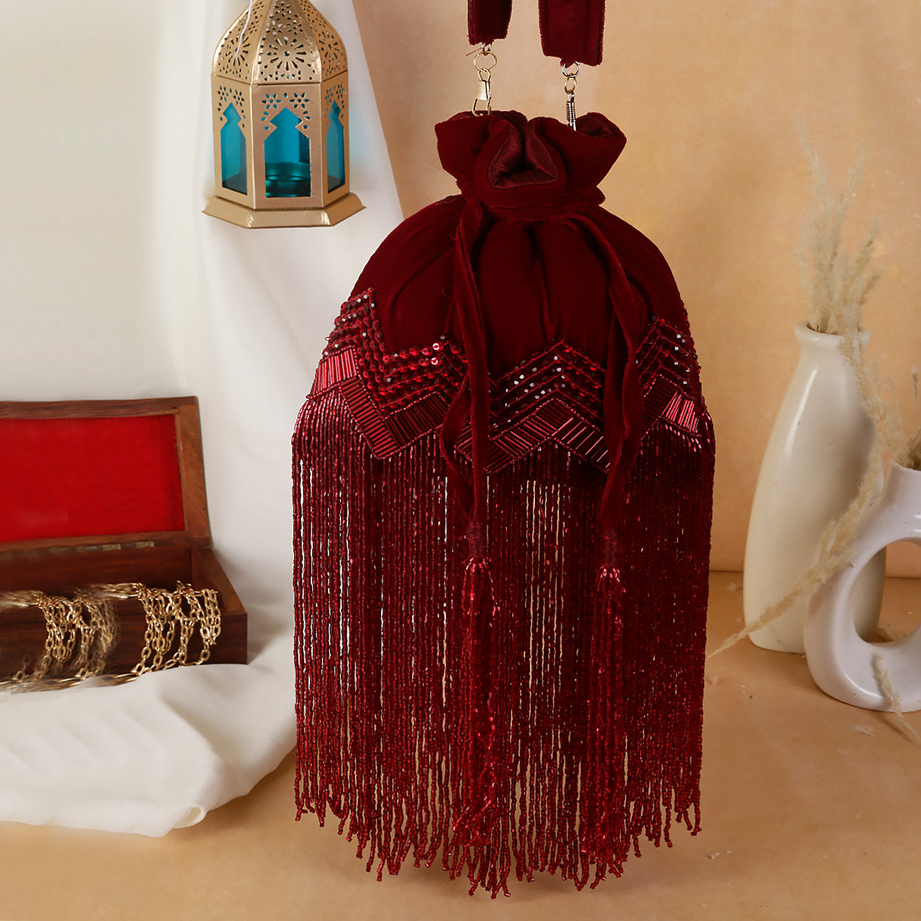 Swisni long tassel marron potli