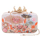 Eye catchy embellishment designer clutch