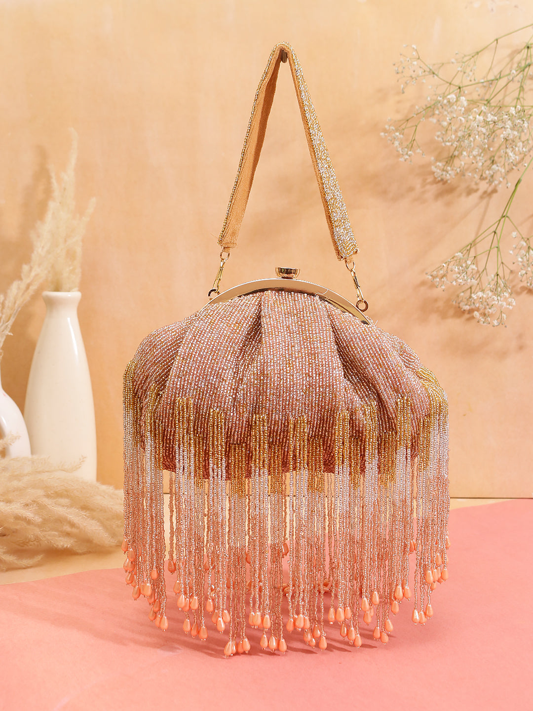 swisni peachy tassel batua clutch