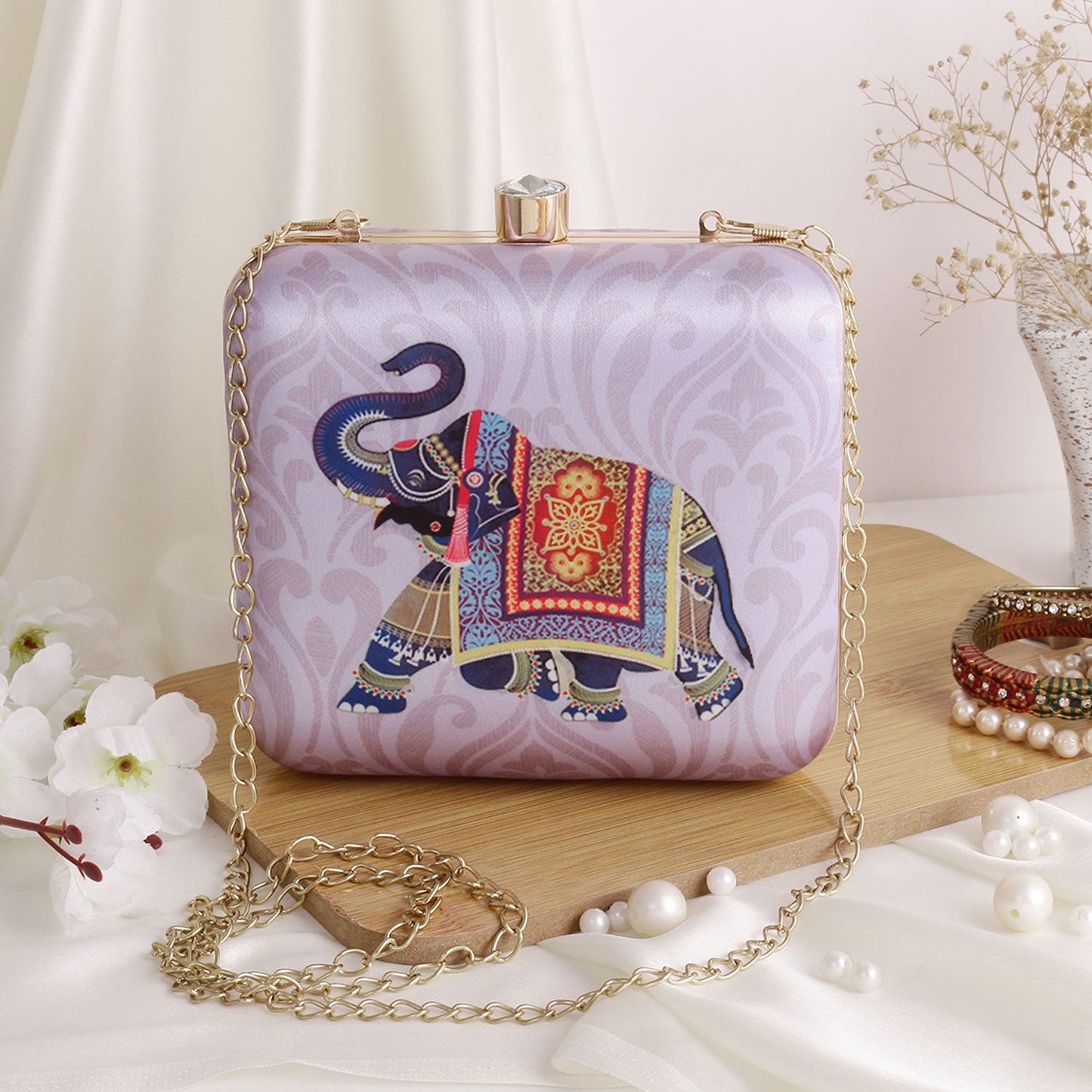 Printed elephant clutch bag