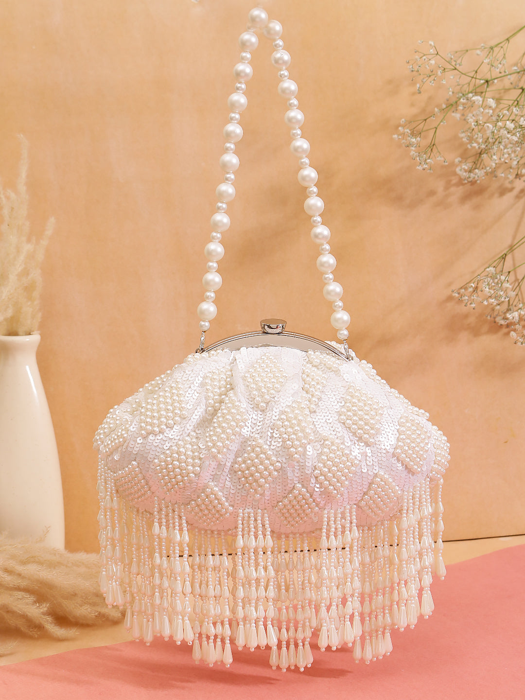 Swisni pearly tassel batua clutch