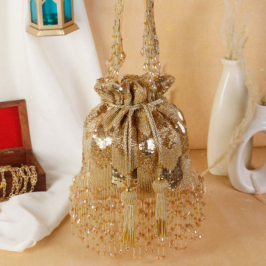 Swisni gold tassel potli bag