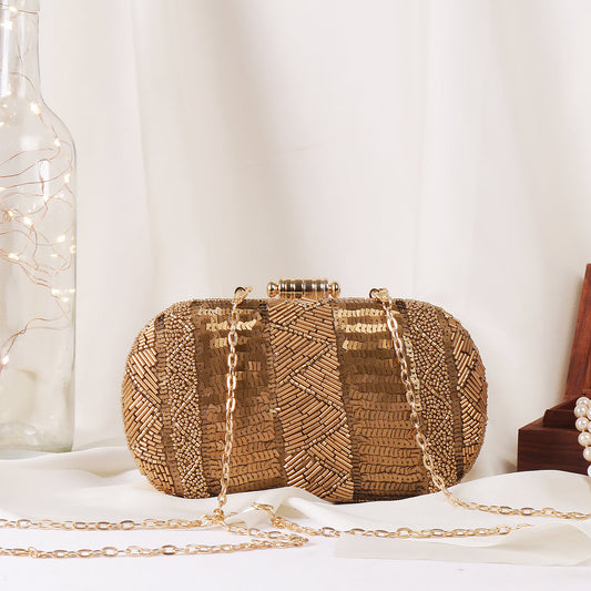 Swisni gold clutch