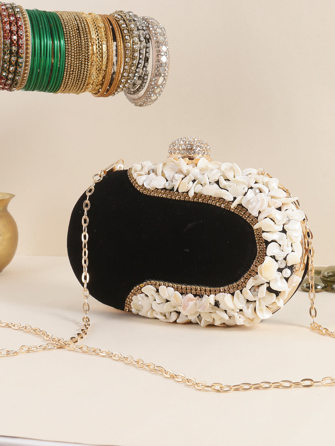 Swisni black oval clutch bag