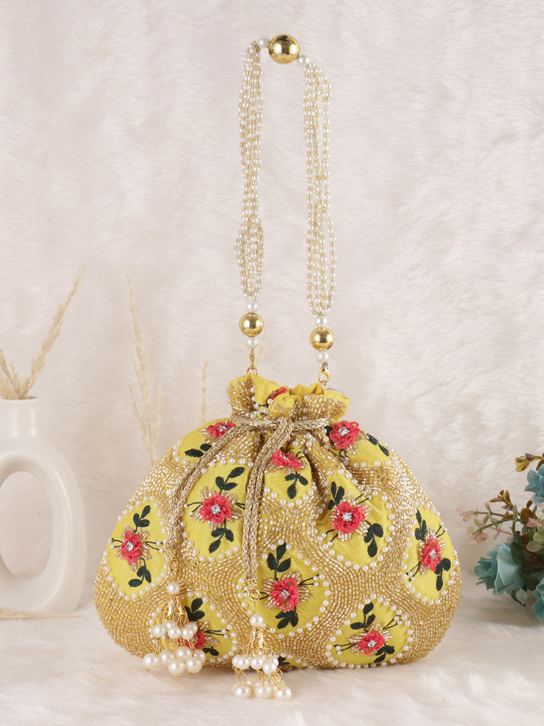 Swisni yellow thread embroidered potli bag