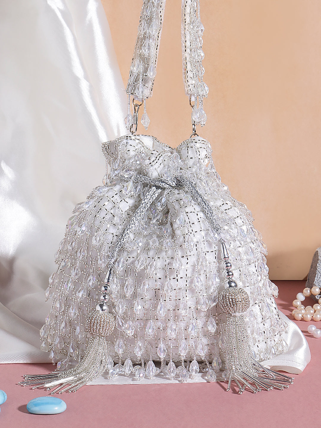 Swisni white crystal heavy potli bag