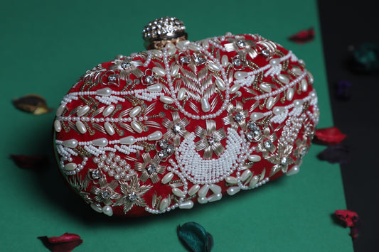 Red embroidery oval clutch