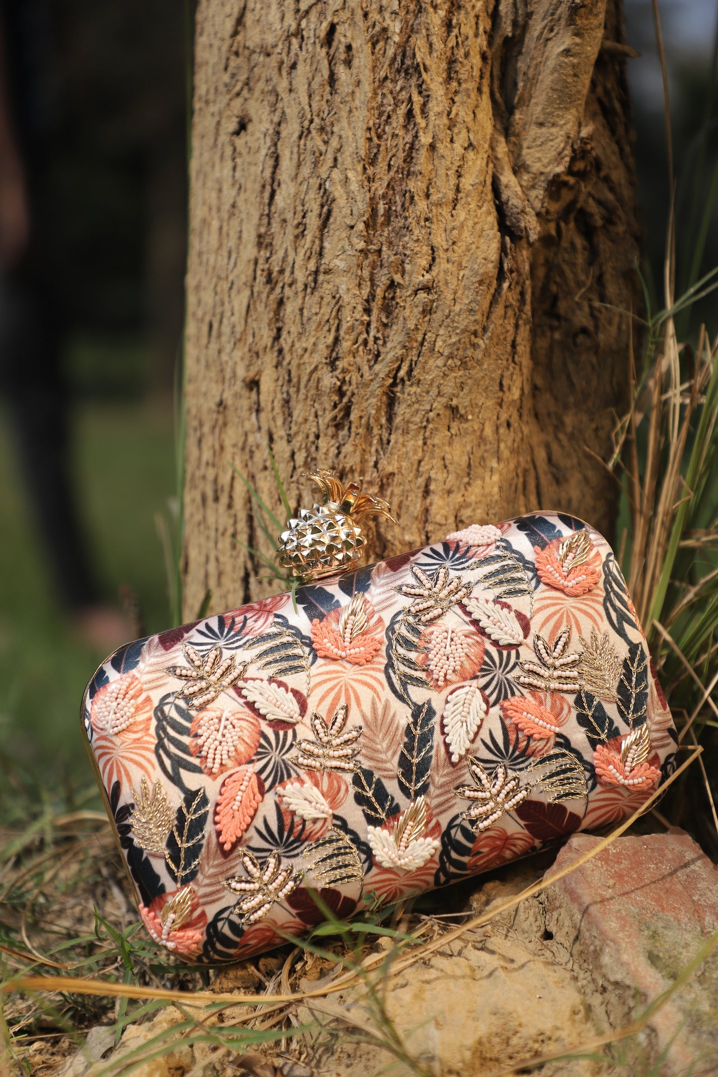 Printed embroidered pineapple clutch bag