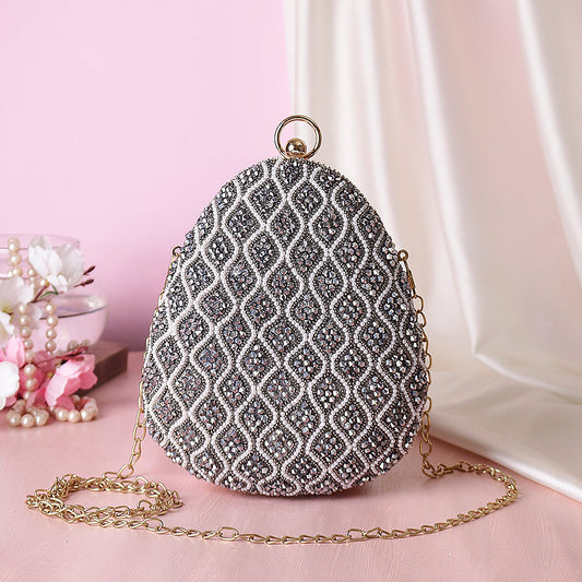 Elegant grey embroidered almond shape clutch