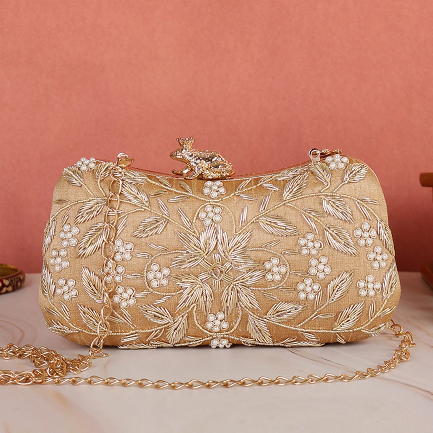 Golden embroidery frog knob clutch