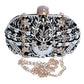 Handmade-embellishment black oval clutch