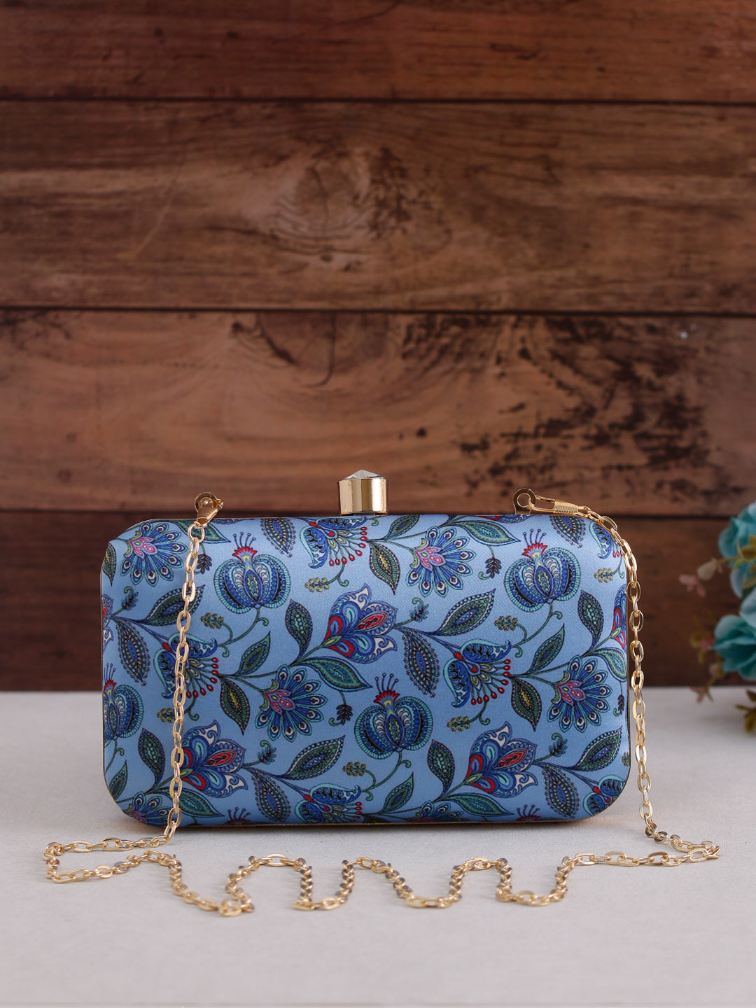 Swisni blue printed clutch